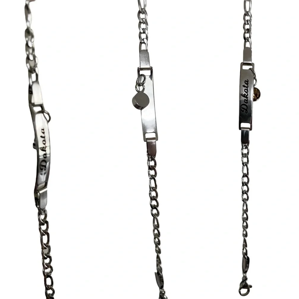 “Dakota” Baby/ Kid’s Silver Metal Name Bracelet with Orange Rhinestone Charm